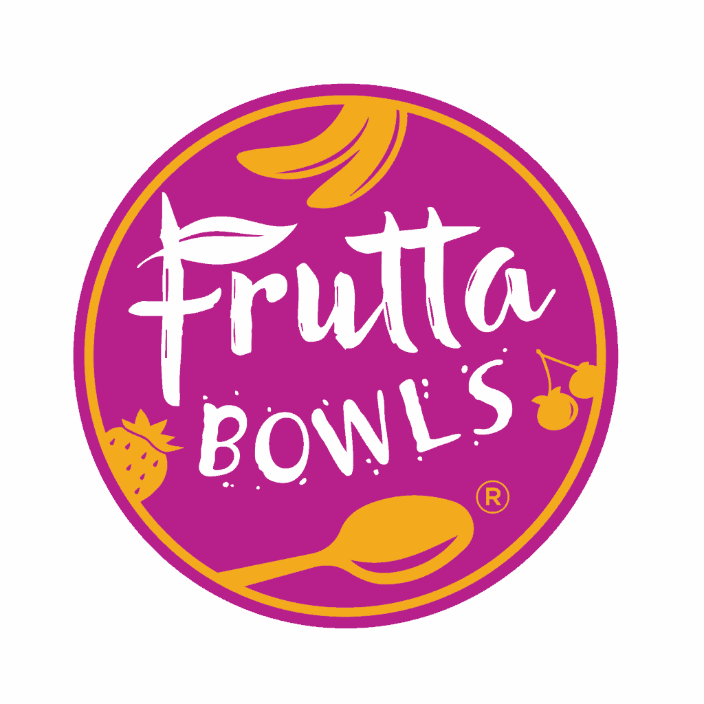 A round logo with the words “Frutta Bowls” in white on a magenta background, featuring yellow fruit graphics and a spoon within a yellow border.